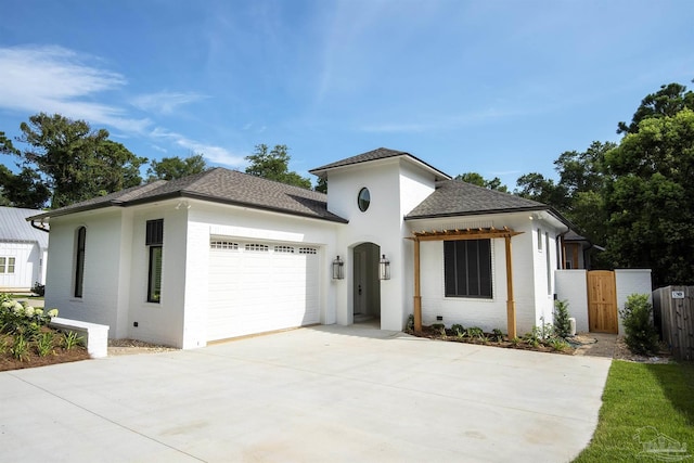 view of front of property with a garage