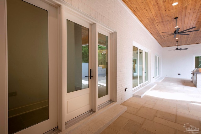 view of patio / terrace with french doors and ceiling fan