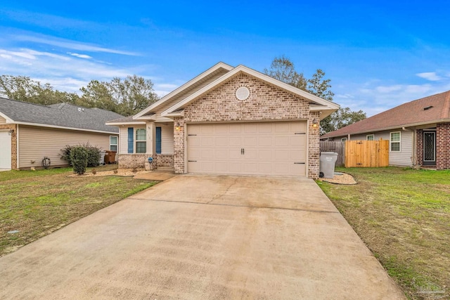 view of front of house with a garage and a front lawn