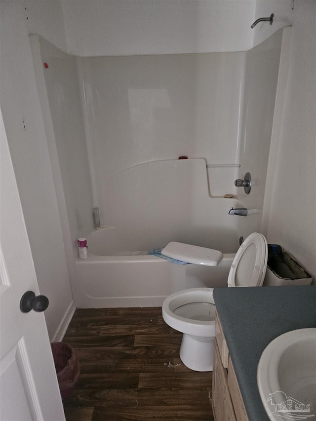 6027 Villeneuve Ln, Pensacola, FL 32526 - bathroom featuring wood finished floors, vanity, and shower / bath combination