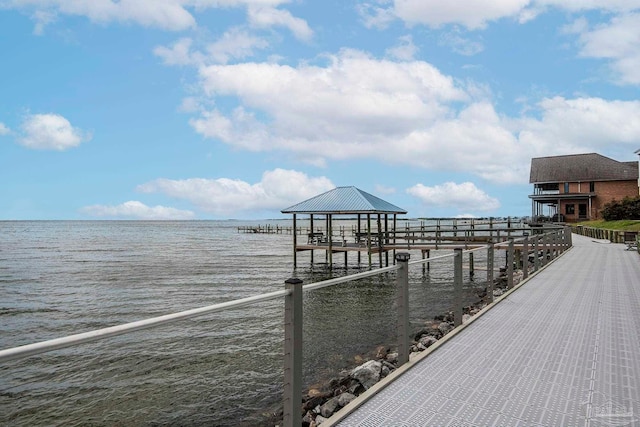 dock area featuring a gazebo and a water view