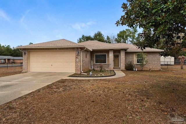 single story home with a garage and a front yard