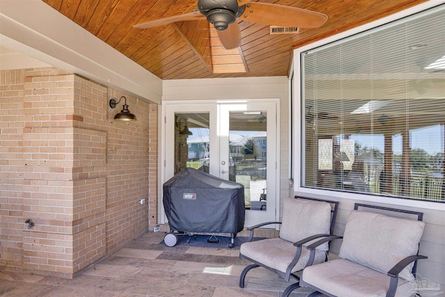 view of patio with ceiling fan, visible vents, a grill, and french doors