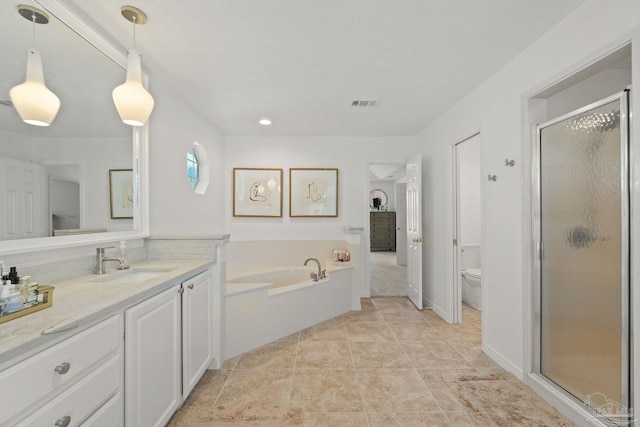 full bathroom with vanity, plus walk in shower, toilet, and tile patterned floors