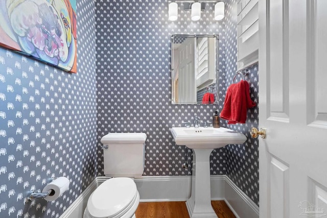 3410 N 18th Ave, Pensacola, FL 32503 - half bath featuring toilet and wood finished floors