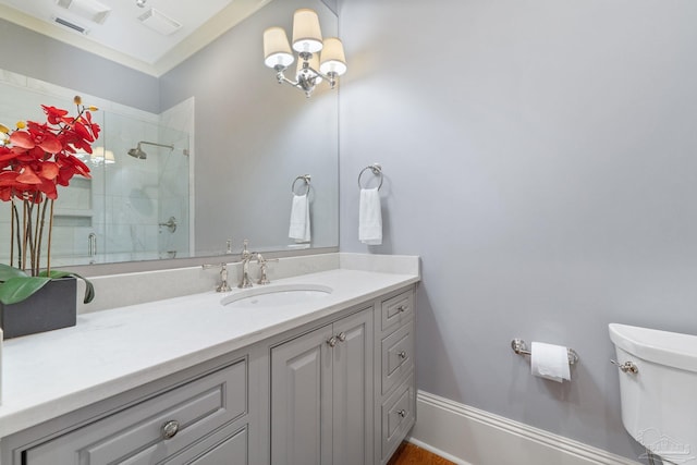 3410 N 18th Ave, Pensacola, FL 32503 - bathroom with vanity, baseboards, toilet, visible vents, and a tile shower