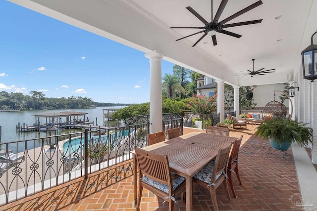 3410 N 18th Ave, Pensacola, FL 32503 - view of patio featuring a water view, ceiling fan, a boat dock, outdoor dining area, and an outdoor hangout area