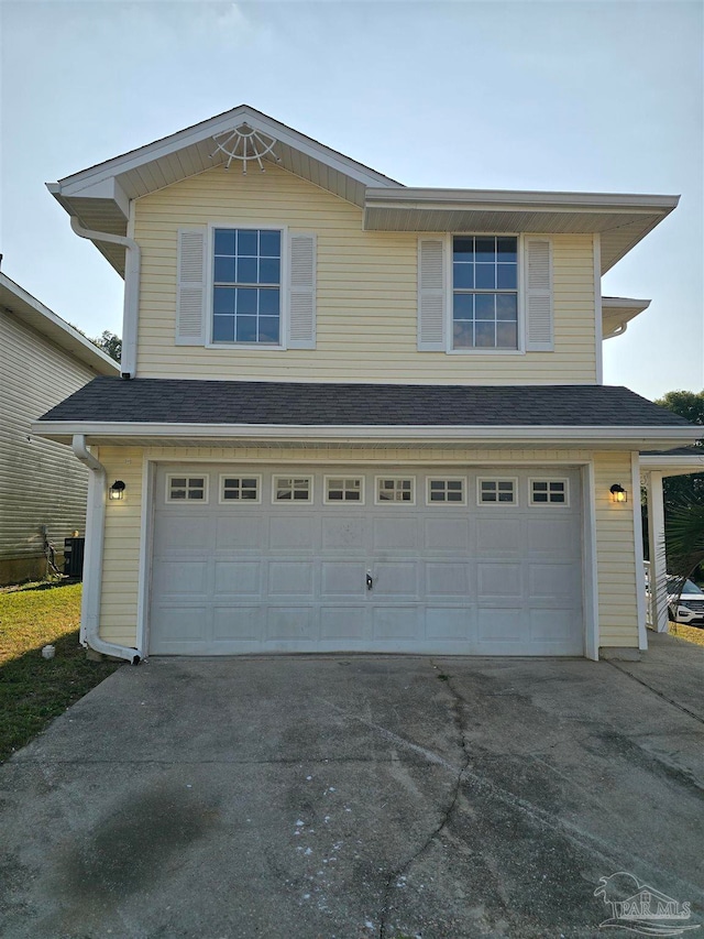 view of property with a garage