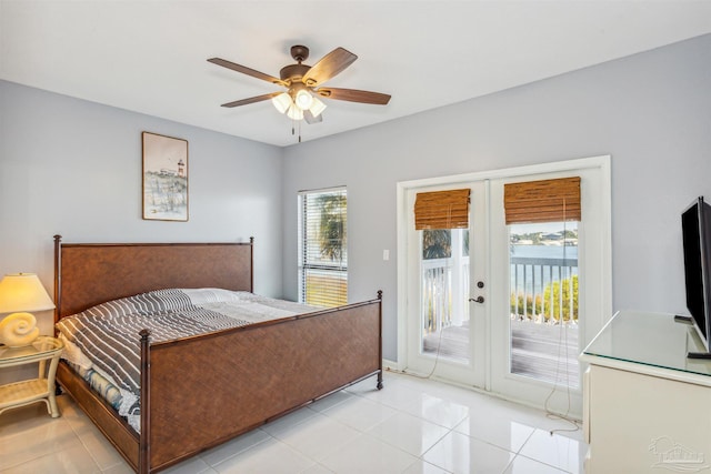 bedroom with ceiling fan, light tile patterned floors, french doors, and access to exterior