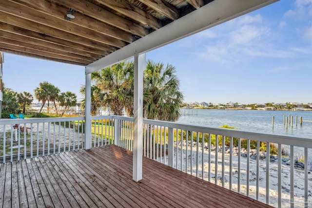 deck featuring a water view