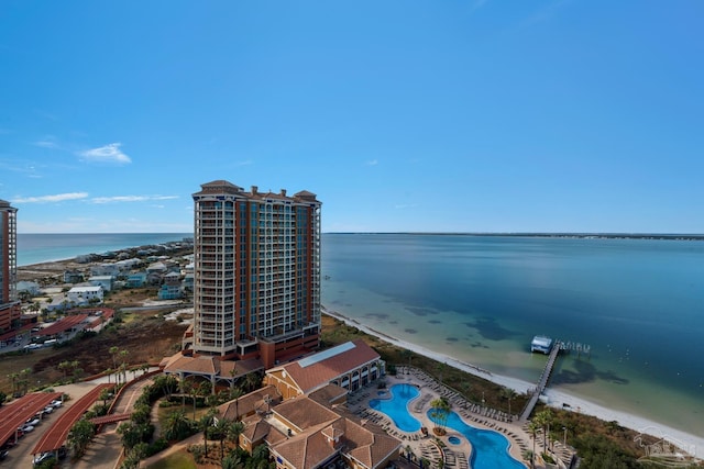 bird's eye view with a view of the beach and a water view