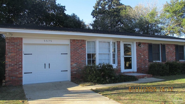 ranch-style house featuring a garage