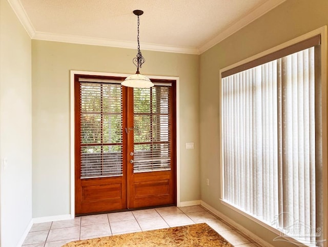 doorway featuring ornamental molding, a textured ceiling, and light tile patterned floors