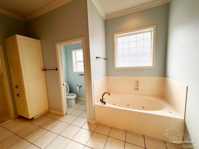 bathroom with a tub to relax in, crown molding, toilet, and tile patterned floors