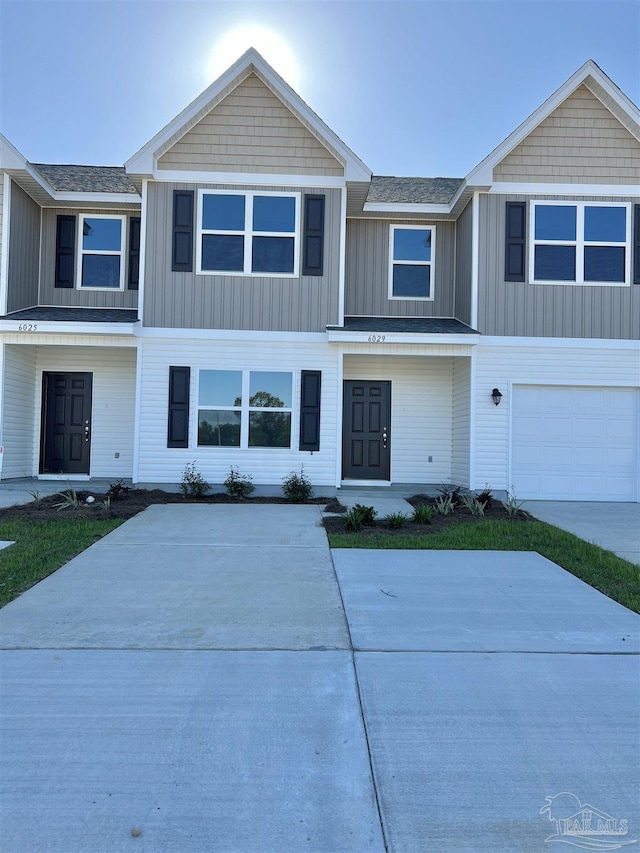 view of front of property with a garage