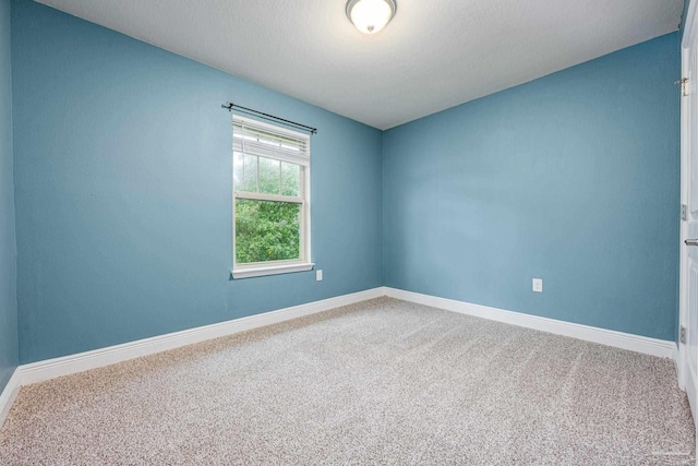 1885 Natures Way, Gulf Breeze, FL 32563 - spare room featuring carpet floors and baseboards