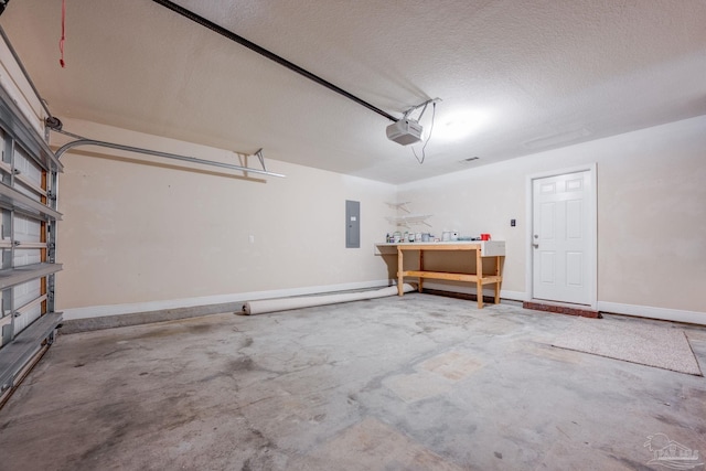 1885 Natures Way, Gulf Breeze, FL 32563 - garage with a garage door opener, a workshop area, electric panel, and baseboards