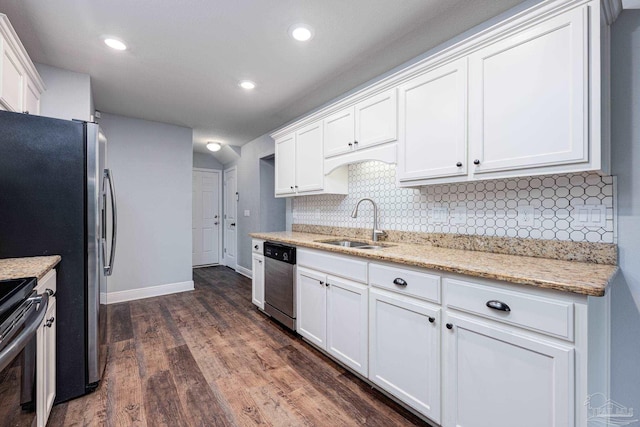 kitchen with sink, dark hardwood / wood-style flooring, white cabinets, and appliances with stainless steel finishes