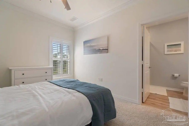 bedroom featuring ornamental molding, light hardwood / wood-style floors, and ceiling fan