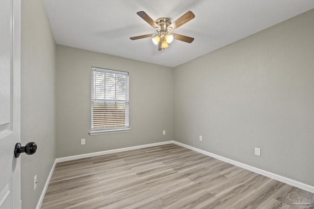 3985 Whitehall Dr, Pace, FL 32571 - empty room with baseboards, light wood-style floors, and a ceiling fan