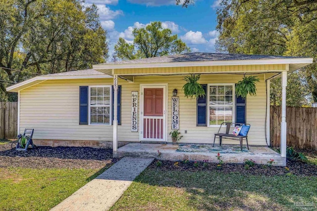 3985 Whitehall Dr, Pace, FL 32571 - bungalow featuring covered porch and fence