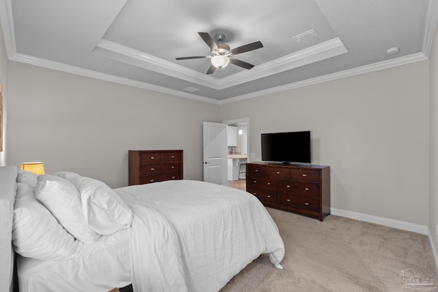 bedroom with a raised ceiling, crown molding, light colored carpet, ceiling fan, and baseboards