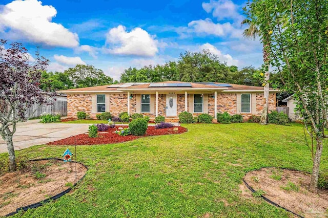 2762 Christine St, Pensacola, FL 32526 - single story home with solar panels and brick siding