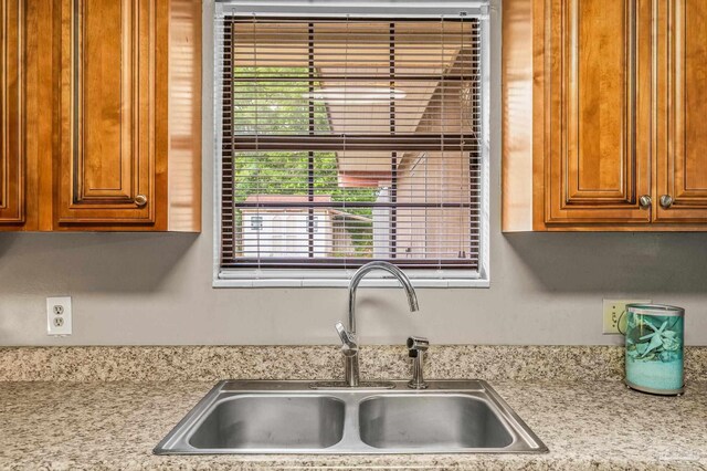 2762 Christine St, Pensacola, FL 32526 - kitchen view of brown cabinets and light stone countertops