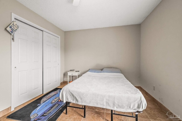 2762 Christine St, Pensacola, FL 32526 - bedroom with a closet, ceiling fan, and tile patterned floors