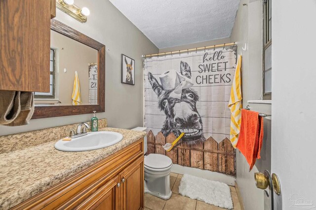 2762 Christine St, Pensacola, FL 32526 - bathroom with vanity, a textured ceiling, tile patterned flooring, and curtained shower