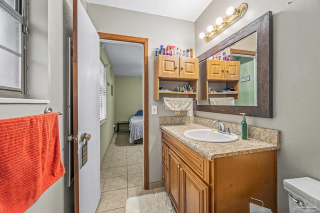 2762 Christine St, Pensacola, FL 32526 - bathroom featuring vanity, tile patterned flooring, and ensuite bathroom