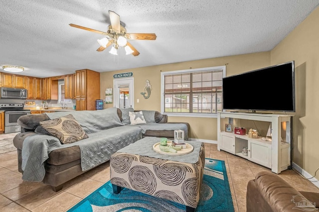 2762 Christine St, Pensacola, FL 32526 - living area with light tile patterned floors, a textured ceiling, and ceiling fan