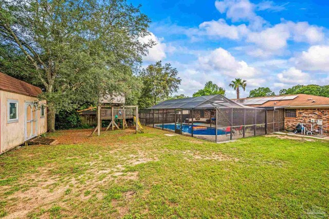 2762 Christine St, Pensacola, FL 32526 - view of yard featuring a playground and a lanai