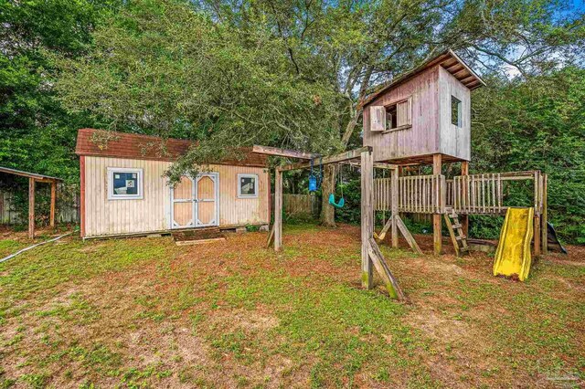 2762 Christine St, Pensacola, FL 32526 - view of yard featuring a playground and an outdoor structure