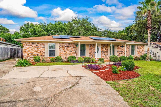 2762 Christine St, Pensacola, FL 32526 - view of front facade with brick siding and solar panels
