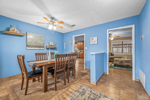 2762 Christine St, Pensacola, FL 32526 - dining area with a ceiling fan and a textured ceiling