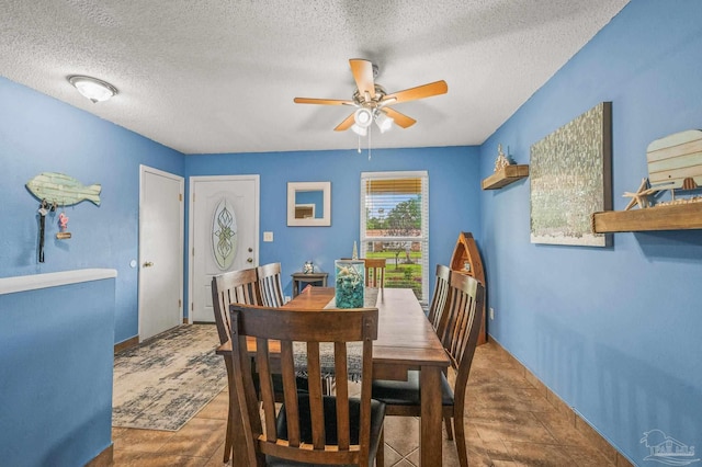 2762 Christine St, Pensacola, FL 32526 - dining area featuring ceiling fan and a textured ceiling