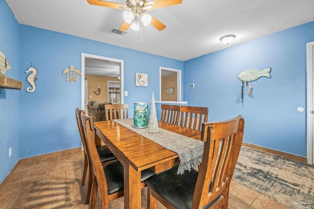 2762 Christine St, Pensacola, FL 32526 - dining space with a textured ceiling and ceiling fan