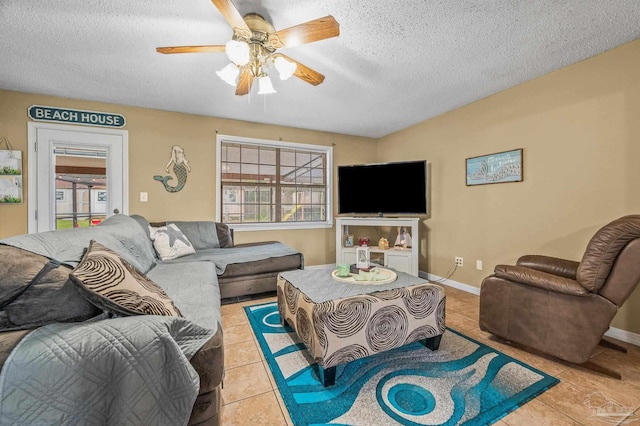 2762 Christine St, Pensacola, FL 32526 - tiled living area featuring plenty of natural light, a textured ceiling, and a ceiling fan