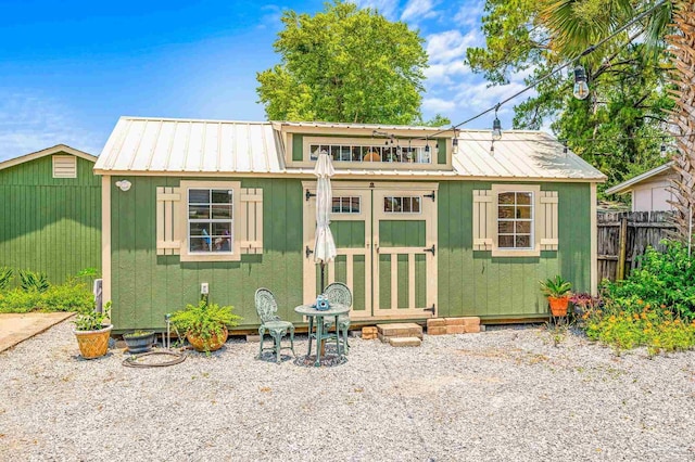 1220 E Cervantes, Pensacola, FL 32501 - view of front facade with metal roof and board and batten siding