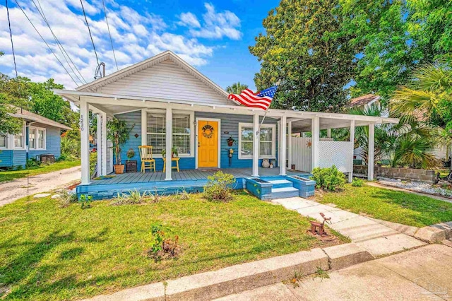 1220 E Cervantes, Pensacola, FL 32501 - view of front of home with a front lawn and covered porch