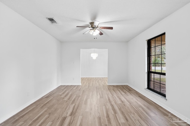 unfurnished room featuring ceiling fan and light hardwood / wood-style flooring