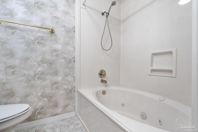 bathroom with shower / bath combination, tile patterned floors, and toilet