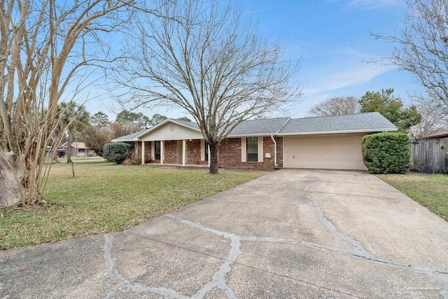 single story home with a garage and a front lawn