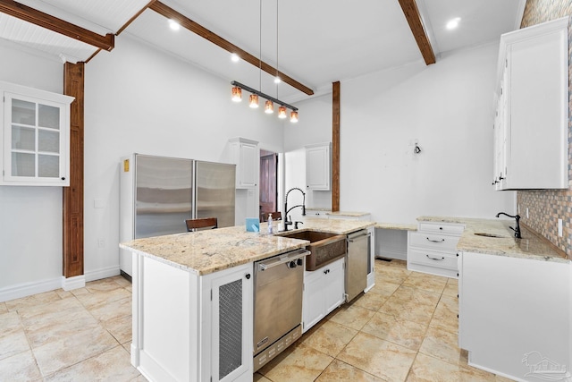 kitchen with white cabinetry, an island with sink, hanging light fixtures, stainless steel appliances, and beam ceiling