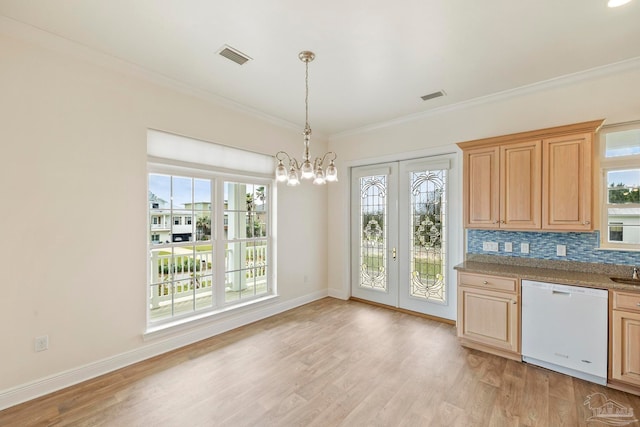 kitchen with dishwasher, light hardwood / wood-style floors, and a healthy amount of sunlight