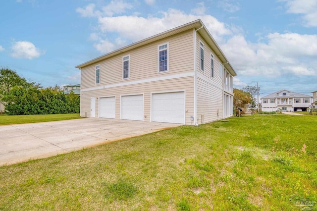 view of property exterior with a garage and a lawn