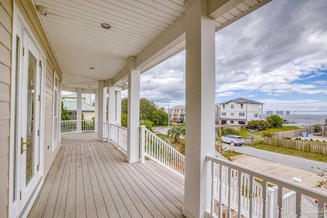 wooden deck featuring covered porch