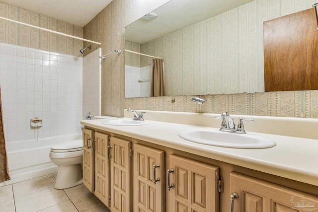 full bathroom featuring tile patterned floors, vanity, shower / bathtub combination with curtain, and toilet