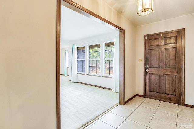 entryway featuring light tile patterned floors